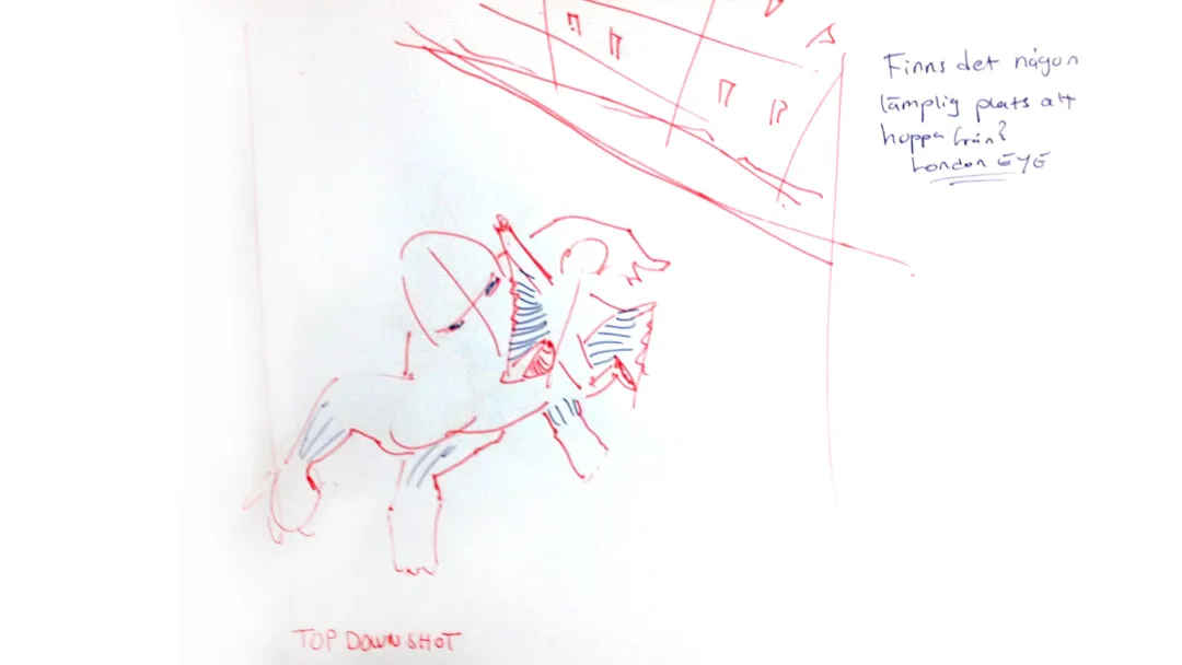 Red and blue notebook sketch of a crouching figure viewed from above